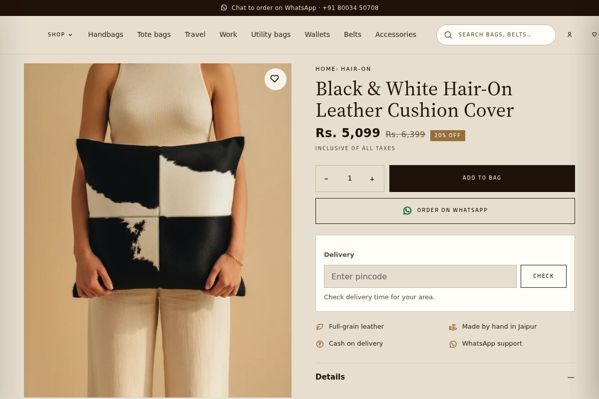 2. Black & White Hair-On Leather Cushion Cover: Best for a Shared Living Room