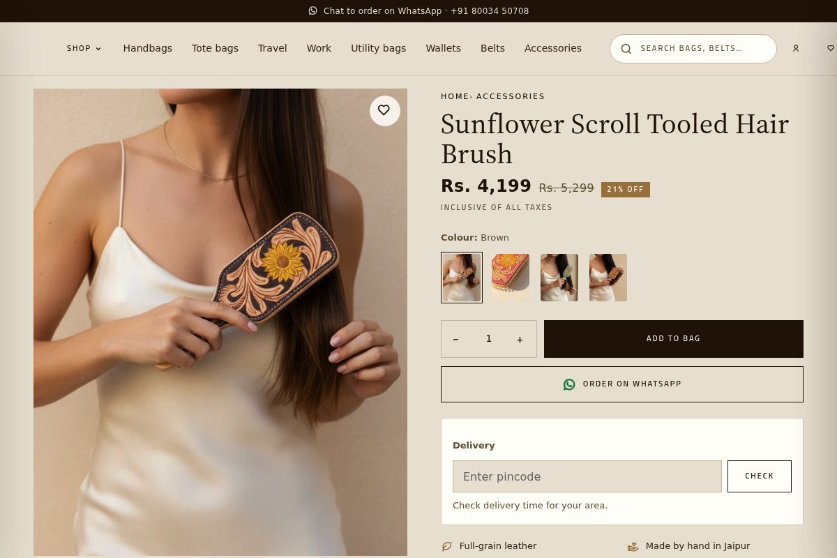 5. Sunflower Scroll Tooled Hair Brush: Best for Aunts, Cousins and Sisters